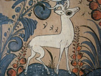 Closeup of Tlaquepaque tile with deer