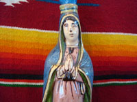 Mexican vintage pottery and ceramics, and Mexican vintage folk art, a holy water bottle depicting Our Lady of Guadalupe, Tlaquepaque, c. 1930-40. The bottle bears the early stamp of the Arias store in Tlaquepaque. Photo of the Virgin's face.
