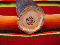 Mexican vintage pottery and ceramics, and Mexican vintage folk art, a holy water bottle depicting Our Lady of Guadalupe, Tlaquepaque, c. 1930-40. The bottle bears the early stamp of the Arias store in Tlaquepaque. Photo showing the Arias stamp on the bottom.