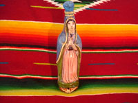 Mexican vintage pottery and ceramics, and Mexican vintage folk art, a holy water bottle depicting Our Lady of Guadalupe, Tlaquepaque, c. 1930-40. The bottle bears the early stamp of the Arias store in Tlaquepaque.