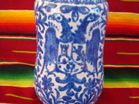 Mexican vintage pottery and ceramics, a Talavera vase from Puebla, c. 1940. Beautiful blue designs of the double-headed Hapsburg eagle, a wonderful plant with a flower, and a beautiful pomegranate (granada). A closeup of the double-headed eagle.