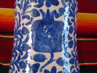 Mexican vintage pottery and ceramics, a Talavera vase from Puebla, c. 1940. Beautiful blue designs of the double-headed Hapsburg eagle, a wonderful plant with a flower, and a beautiful pomegranate (granada). A view of the pomegranate on the vase.