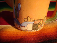 Mexican vintage pottery and ceramics, a teapot and creamer set from Tlaquepaque, c. 1930-40. Closeup photo.