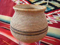 Native American Indian basket, a very finely woven polychrome olla, Chemehuevi, c. 1920's. Another photo of the Chemehuevi Indian basket.