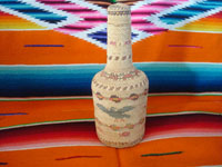 Native American Indian vintage basketry and weaving, a wonderful basketry covered bottle, Makah, Washington state, c. 1940.  Main photo of the basketry bottle showing the eagle.