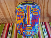 Mexican vintage folk art, and Mexican vintage woodcarvings and masks, a beautifully beaded wood-carved Huichol mask, Jalisco, c. 1980. Main photo of the beaded mask.