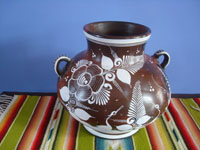 Mexican vintage pottery and ceramics, a beautiful pottery vase with wonderful colors and decorations, Tonala, Jalisco, c. 1950's. Main photo of the vasel