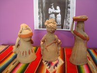 Mexican vintage folk art, three pottery statues of women of the marketplace, mercanderas, by the famous ceramicist Teodora Blanco, Santa Maria Atzompa, Oaxaca, c. 1960's.  Photo of the back side of the three figures.