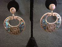 Mexican vintage silver jewelry, Taxco sterling silver earrings with abalone shell inlay and an Aztec design, c. 1940's.