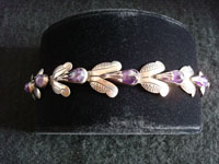Mexican vintage silver jewelry, Taxco sterling silver bracelet with amethyst in a foral design, c. 1930's.