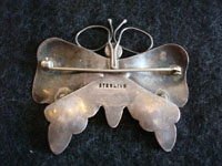 Closeup photo showing the back of the silver Navajo butterfly pin.