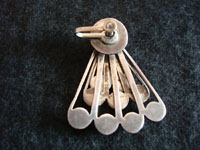 Photo of back side of vintage Mexican silver earrings with fan-shape.