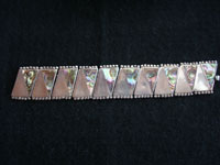 Photo of fully extended Taxco silver bracelet with abalone shell.