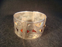Mexican vintage silver jewelry and Taxco vintage silver jewelry, a sterling silver bracelet with abalone and tortoise shell inlay, c. 1940's.  A photo of the bracelet clasped.