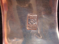 Mexican vintage silver jewelry and Taxco vintage silver jewelry, a sterling silver bracelet with abalone and tortoise shell inlay, c. 1940's.  Photo showing signature or stamp on back of bracelet.