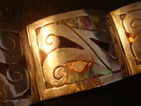 Mexican vintage silver jewelry and Taxco vintage silver jewelry, a sterling silver bracelet with abalone and tortoise shell inlay, c. 1940's.  Another closeup photo of the bracelet.