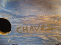 Mexican vintage pottery and ceramics, and Mexican vintage folk art, a burnished pottery fish from Tonala Jalisco, c. 1930's. A photo showing the signature of the artist on the bottom of the pottery fish.