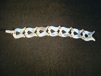 Mexican vintage silver jewelry and Taxco vintage silver jewelry, a sterling silve bracelet, c. 1940's. The work on this piece is exquisite!  Photo of back side of bracelet.