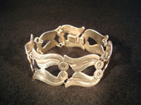 Mexican vintage silver jewelry and Taxco vintage silver jewelry, a sterling silve bracelet, c. 1940's. The work on this piece is exquisite!  Main photo.