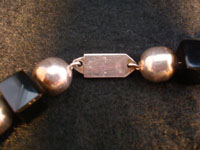 Mexican vintage silver jewelry and Taxco silver jewelry, a wonderful necklace composed of silver balls and square pieces of black jet, signed with the mark and number of Jose Marmolejo, Taxco, c. 1960-70's. Another closeup photo of the clasp.