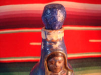 Mexican vintage pottery and ceramics and Mexican vintage folk art, a pottery bottle in the form of Our Lady of Guadalupe from Tlaquepaque, Jalisco, c. 1930's. Photo of the top of the bottle with the clay stopper.