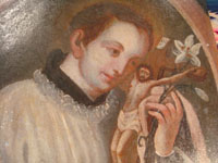 Mexican vintage devotional art, a retablo painted on tin, c. 1890-1900. The retablo is very beautifully painted with an image of St. Stanislaus Koska, a Jesuit saint much revered in Mexico. Closeup photo of the retablo.