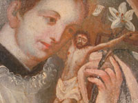 Mexican vintage devotional art, a retablo painted on tin, c. 1890-1900. The retablo is very beautifully painted with an image of St. Stanislaus Koska, a Jesuit saint much revered in Mexico. Closeup photo showing the face of St. Stanislaus.