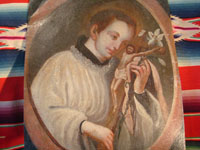 Mexican vintage devotional art, a retablo painted on tin, c. 1890-1900. The retablo is very beautifully painted with an image of St. Stanislaus Koska, a Jesuit saint much revered in Mexico. Main photo of the retablo.