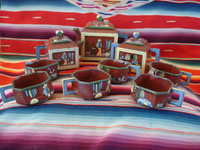 Mexican vintage pottery and ceramics, an entire tea set with teapot, creamer and sugar-bowl, and six cups, from the pottery center of Tlaquepaque, Jalisco, c. 1930's. Main photo of the entire tea set.