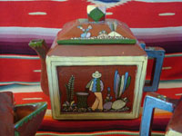 Mexican vintage pottery and ceramics, an entire tea set with teapot, creamer and sugar-bowl, and six cups, from the pottery center of Tlaquepaque, Jalisco, c. 1930's. A photo showing the tea pot.