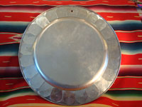 Mexican vintage tin-art or tinwork art, a large tin tray with copper, c. 1950. The tray itself is surrounded by punched-out bolitas or balls, with alternating tin and copper composition. Photo of the back side of the tray.