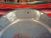 Mexican vintage tin-art or tinwork art, a large tin tray with copper, c. 1950. The tray itself is surrounded by punched-out bolitas or balls, with alternating tin and copper composition. Another photo of the back of the tray.