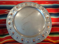 Mexican vintage tin-art or tinwork art, a large tin tray with copper, c. 1950. The tray itself is surrounded by punched-out bolitas or balls, with alternating tin and copper composition. Another photo showing the entire front of the tray.