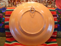 Mexican vintage pottery and ceramics, an incredibly large and beautiful pottery charger from Tlaquepaque, Jalisco, c. 1920-30's. The artwork on this charger is spectacular. This piece is museum-quality! A photo of the back of the charger.