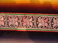 Mexican vintage textiles and sarapes, a spectacular Saltillo sarape with bands of tela deshilada (threads are removed and lovely flowers are then created with the remaining threads), c. 1920-40. This is an extremely rare and beautiful Mexican textile.  Closeup photo of one band of the sarape, showing the tela deshilada.