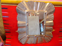 Mexican vintage tin-art, a beautiful tinwork art mirror, Oaxaca, c. 1950's. Main photo of the tinwork art mirror.