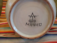 Mexican vintage pottery and ceramics, and Mexican vintage folk art, a beautiful Talavera vase by the famous, late Gorky Gonzalez of Guanajuato, c. 1960. A view of the bottom of the Talavera vase showing Gorky's signature.