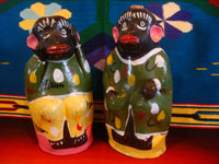 Mexican vintage folk art, and Mexican vintage pottery and ceramics, a pair of pottery monkeys in colorful dress, made to hold wonderful mezcal, Oaxaca, c. 1950's. Main photo of the monkey bottles.
