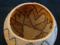 Native American Indian baskets, a stunning Mission basket, Cahuilla, Palm Springs area, c. 1920. Photo of the basket shot from above and looking down at the inside of the Cahuilla Indian basket.