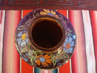 Mexican vintage pottery and ceramics, a beautiful blackware pottery vase with a starry night background and fantastic artwork, Tonala or San Pedro Tlaquepaque, Jalisco, c. 1930's. Photo shot from above the vase looking down at the mouth.