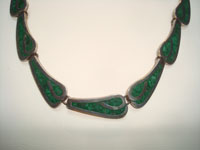 Mexican vintage sterling silver jewelry, and Taxco vintage sterling silver jewelry, a beautiful sterling silver necklace with malachite, Taxco, c. 1940's. Closeup photo of a part of the Taxco silver necklace.