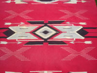 Mexican textiles and sarapes, and New Mexican vintage textiles, a beautiful Chimayo textile with a tight weave and beautiul designs, Chimayo, New Mexico, c. 1930-40's. Closeup photo of some of the decorations.