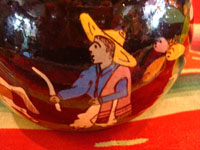 Mexican vintage pottery and ceramics, and Mexican vintage folk art, a pottery bowl or tecomate with wonderful rural scenes on blackware, from Tlaquepaque, Jalisco, c. 1930. Closeup photo of the campesino.