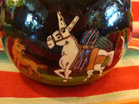 Mexican vintage pottery and ceramics, and Mexican vintage folk art, a pottery bowl or tecomate with wonderful rural scenes on blackware, from Tlaquepaque, Jalisco, c. 1930. Closeup of the burro.