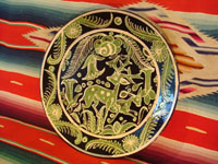Mexican vintage pottery and ceramics, and Mexican vintage folk art, a fantasia pottery plate from Tlaquepaque, Jalisco, c. 1930-40. The artwork on the plate features two lovely deer, one with great horns, amidst flowers and foliage. Main photo.