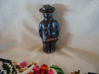 Mexican vintage folk art, and Mexican vintage pottery and ceramics, a wonderful pottery figure depicting the great Mexican muralist, Diego Rivera, Barrio de la Luz, Puebla, c. 1940's. A photo showing the back of the piece.