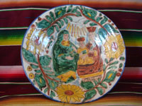 Mexican vintage pottery and ceramics, a lovely talavera bowl decorated with the image of the Baby Christ, along with his Mother, Mary, and St. Anne, the mother of Mary, Guanajuato, c. 1950's.  Main photo of the bowl.