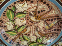 Mexican vintage pottery and ceramics, a beautiful petatillo (background of fine cross-hatching resembling a straw mat or petate in Spanish) and wonderful artwork featuring three sparrows amidst lovely calla lillies and foliage, by Martin Garcia Rios, Tonala, Jalisco, c. 1940.  Closeup photo of the artwork on the front of the charger.