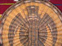 Native American Indian antique basket, a Hopi wicker plaque with eagle design, c. 1930. A closeup photo.