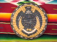 Native American Indian antique basket, a Hopi wicker plaque with eagle design, c. 1930. A photo showing the unfaded back side of the plaque.